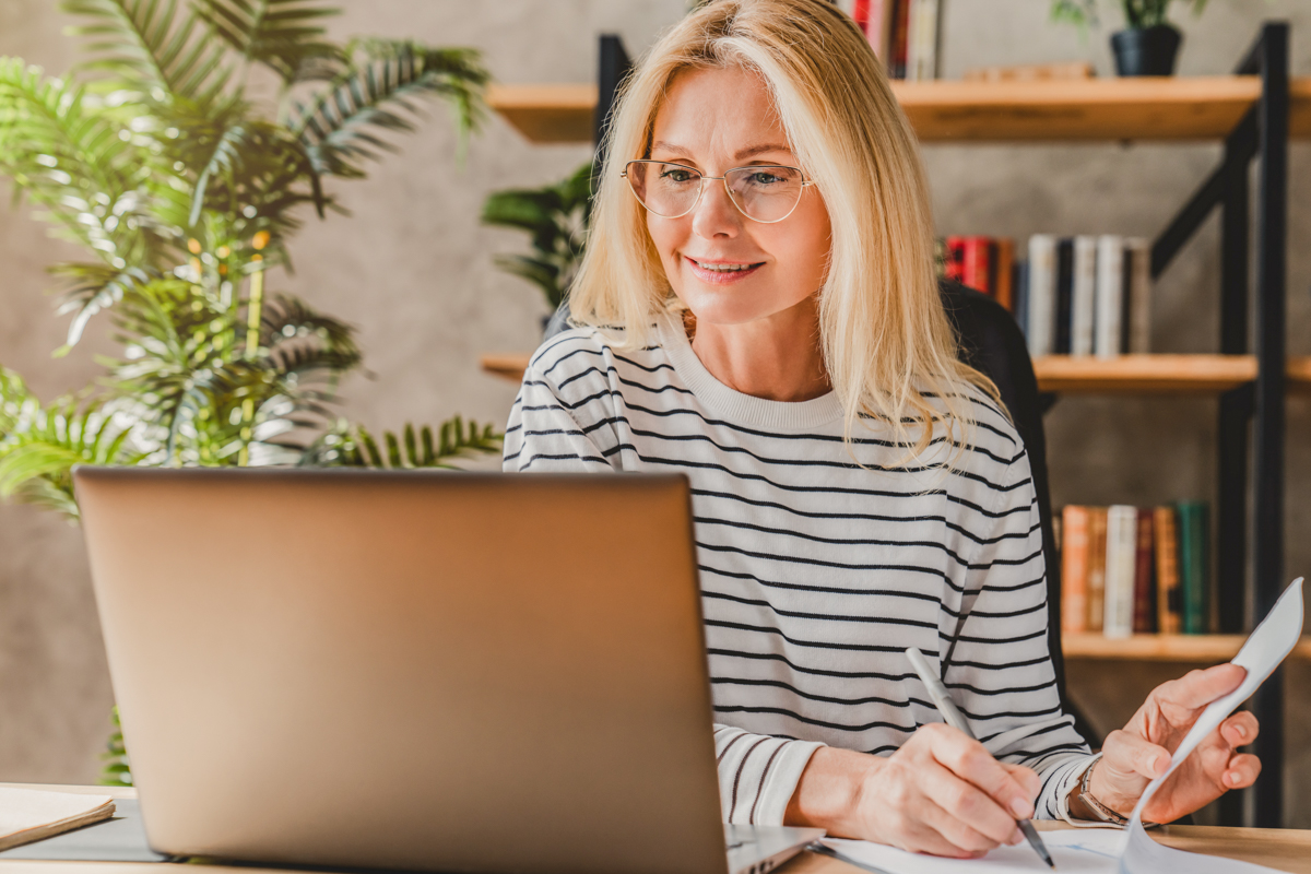 Woman Writing Notes About Mission Trip Fundraising Ideas